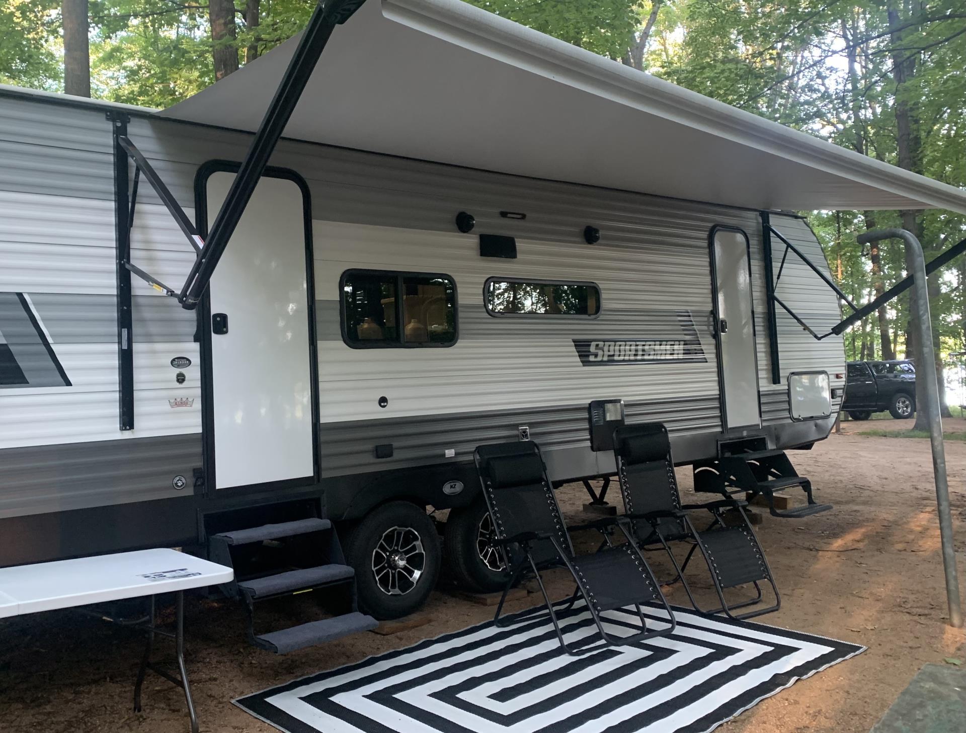 a camper set up in a campground